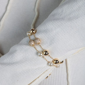 Pulseira Pérolas e Esfera Ouro