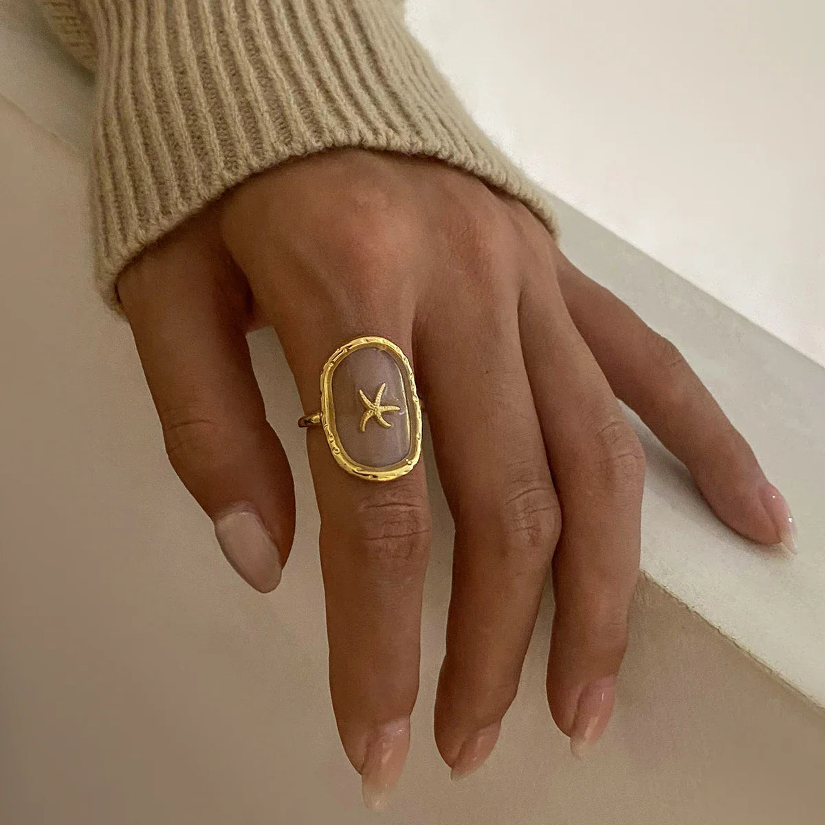 Anel Estrela-do-Mar Aberto Ouro 18K