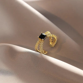 Anel Regulável com Zircônia Preta Folheado a Ouro 18K